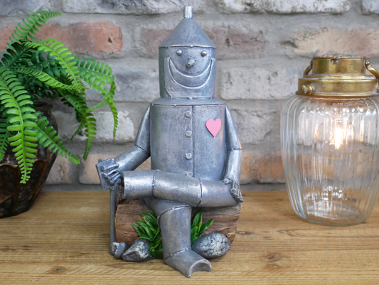 Tin Man Sat On A Log