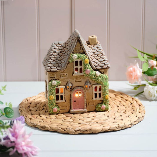 Cottage Garden Stoneware House with Rose Garland and Door Lanterns Candle Holder