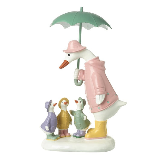 Duck Family Under Umbrella