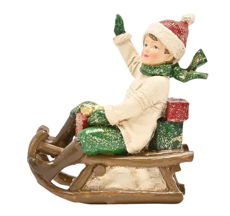 Victorian Boy On Sledge Figurine