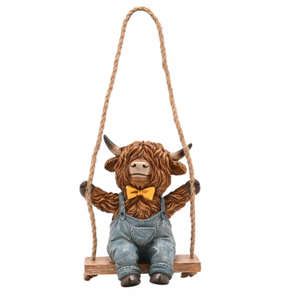 Country Living Highland Cow On A Swing